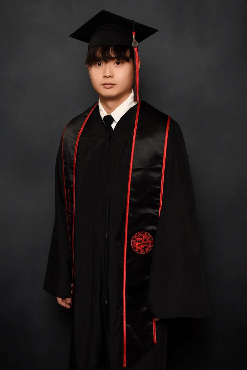 Jittapatana "Patrick" Prayoonpruk in cap and gown at his CSU Northridge computer science graduation.